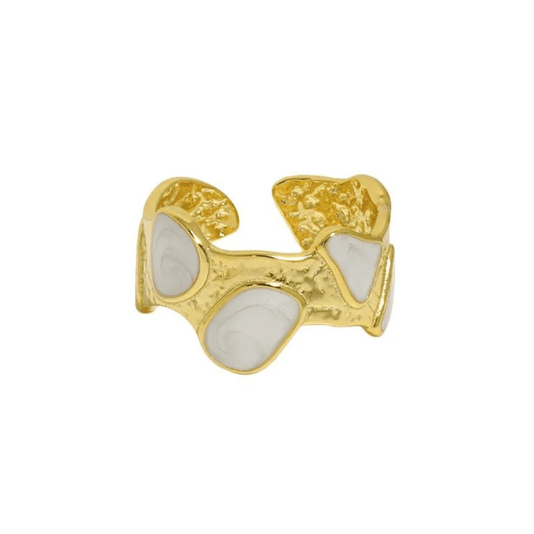 A divine and elegant gold-plated ring named after the Greek goddess Athena. The Celestial Athena Adjustable Ring features a celestial white enamel design, exuding timeless allure and empowering the wearer with a touch of goddess-like charm.