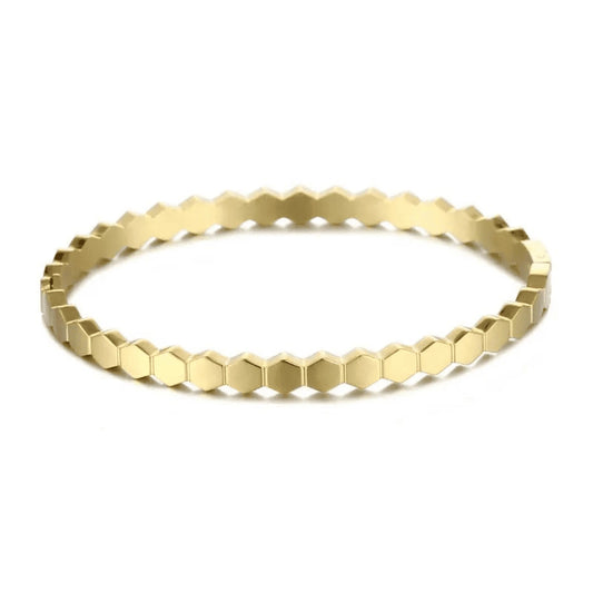 Captivating 18k gold bangle named 'Aurora,' inspired by the goddess of dawn. Its sleek and minimalistic design adds a touch of effortless elegance to any outfit, whether worn alone or stacked with other bracelets.