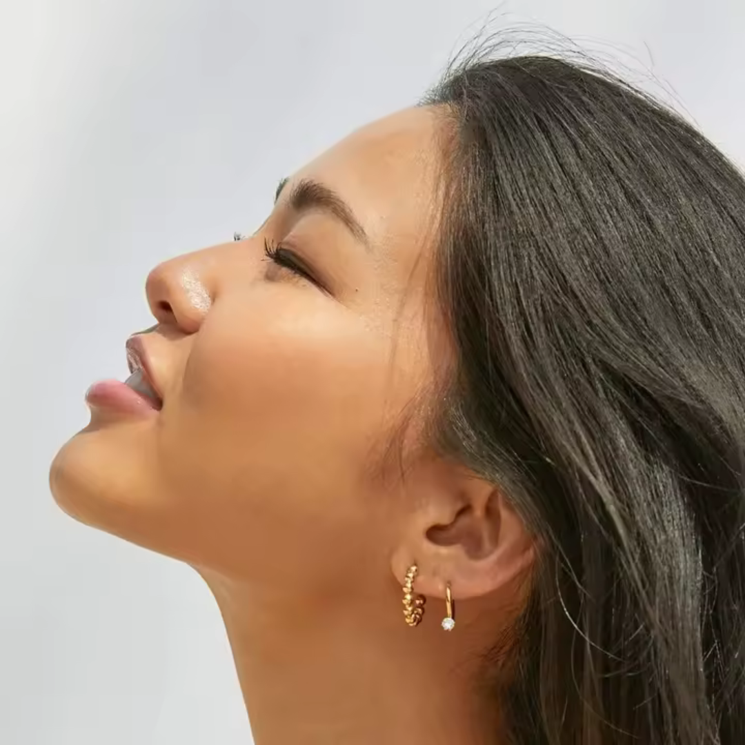 Girl wearing Golden Beaded Hoop Earrings