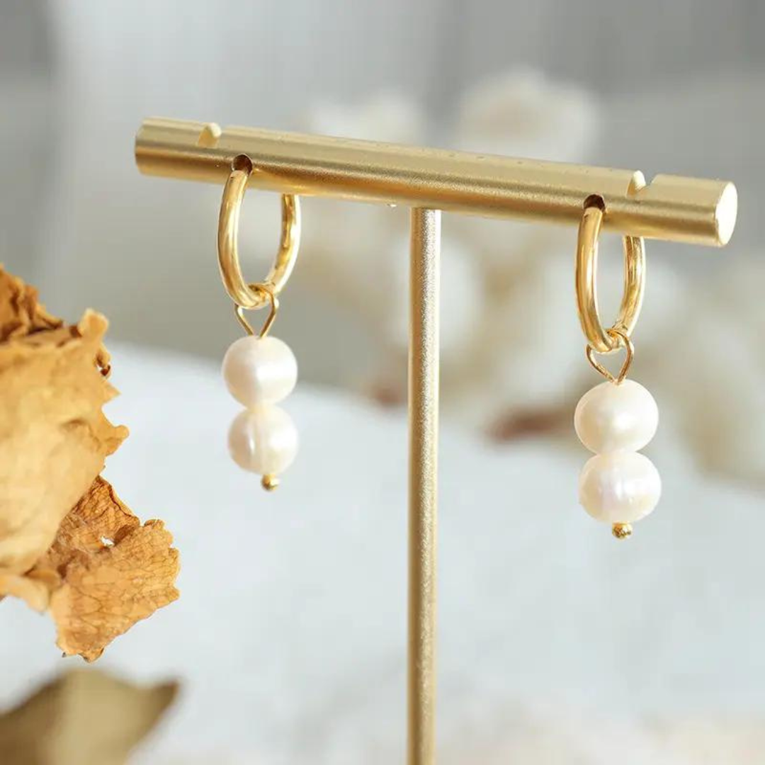  Elegant gold-plated pearl drop earrings, crafted with real S925 silver, adding a touch of sophistication to any outfit.