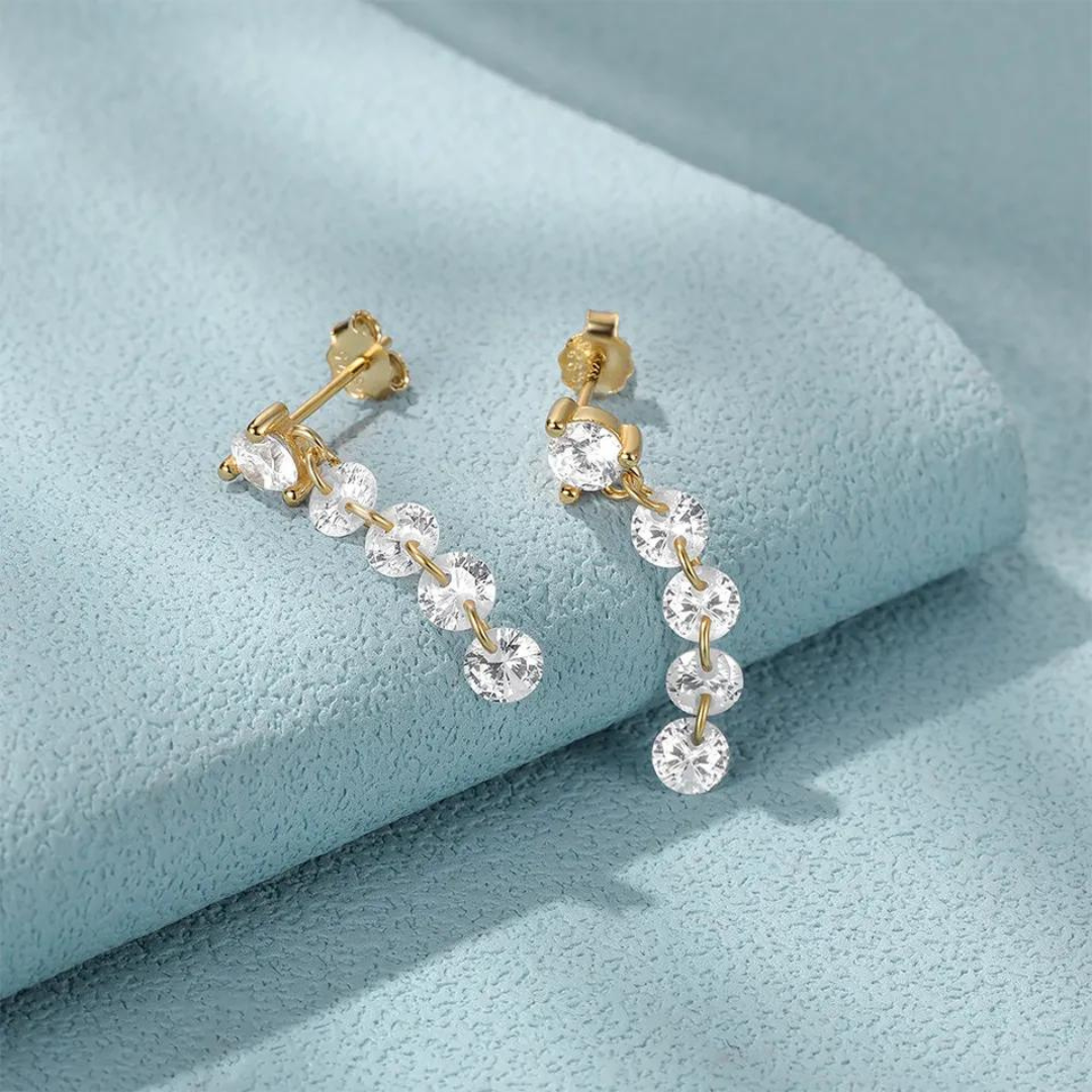 Chandelier Earrings" featuring sterling silver gold-plated design with sparkling zircon accents, effortlessly blending sophistication and everyday glam."