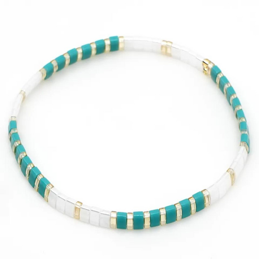 Inspired by the Island of Mykonos, stunning stretch beaded bracelet.  Made from the finest tila beads which shine in white, aqua and silver Tila glass bead stretch band