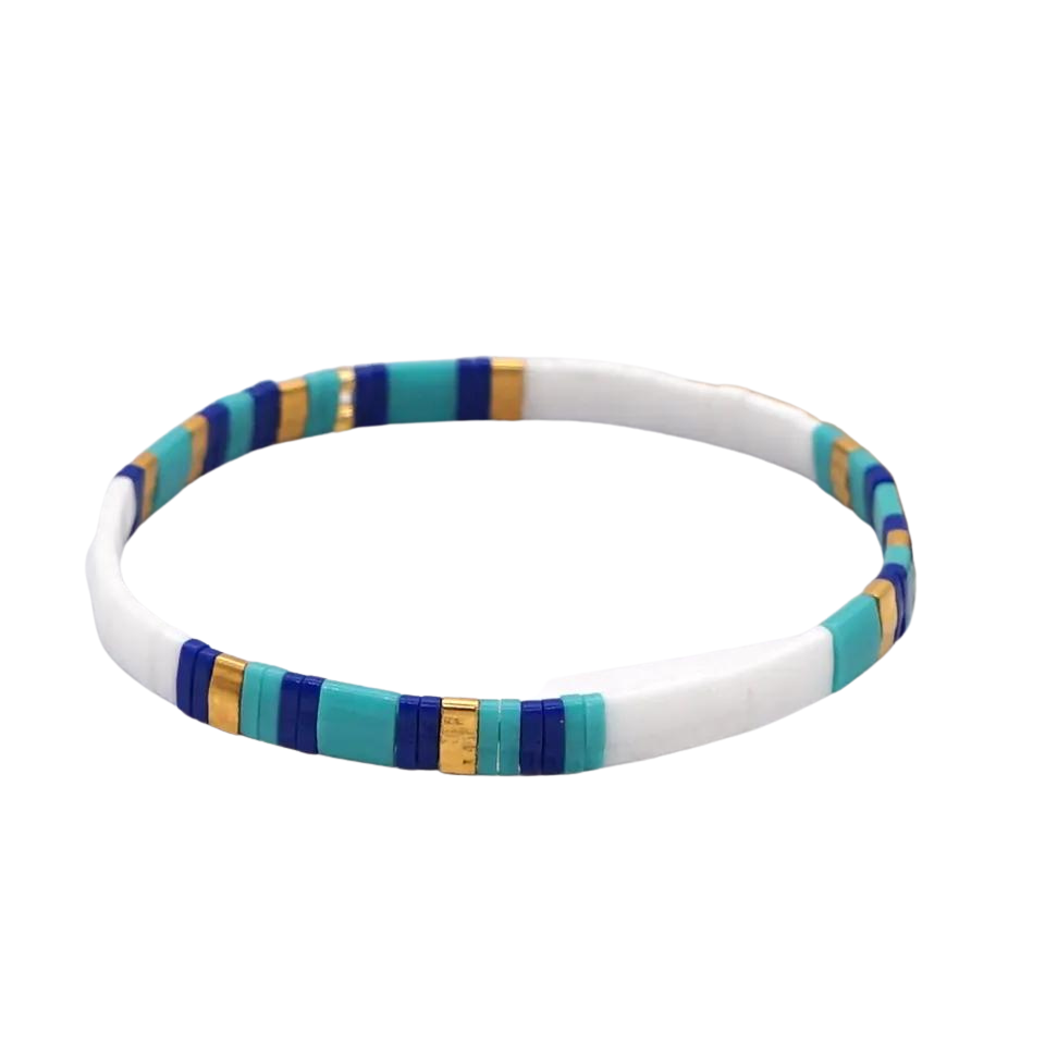 beautiful beach bracelet.  Made of the finest quality tila beads.  Colours inspired by the island of Santorini stunning white, blues, aqua and gold